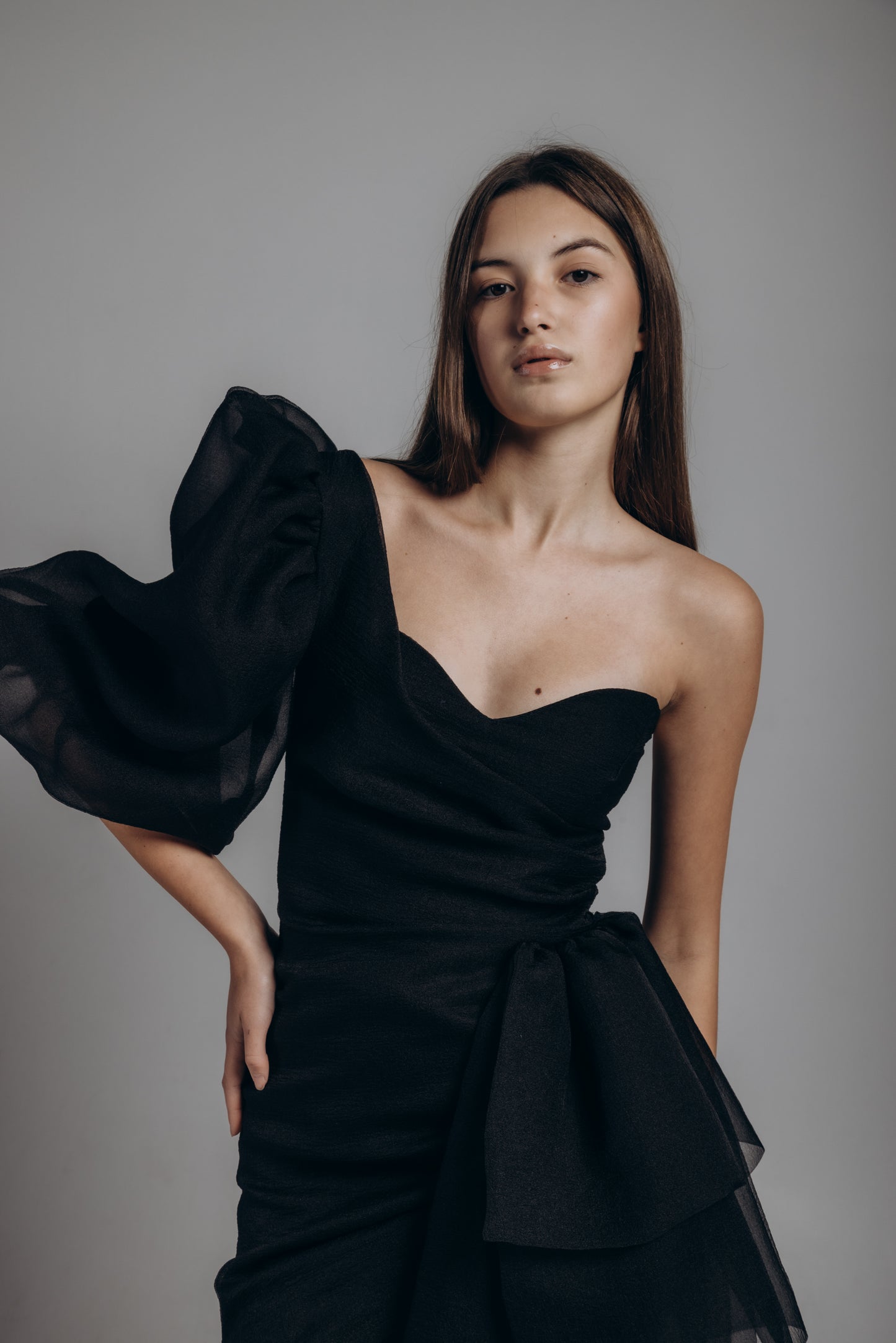 Black organza mini dress with a shoulder